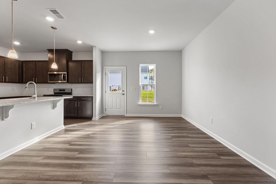 Spacious, unfurnished interior of a new home in Poets Walk, Whitsett (Image 25).