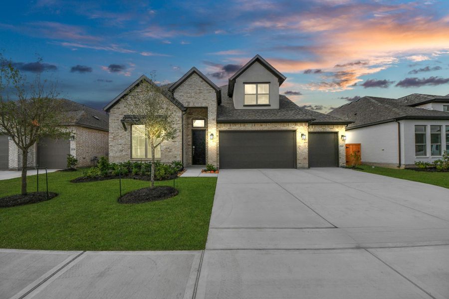 Front exterior of a new home in Marvida, Cypress, TX, highlighting curb appeal (Image 20).