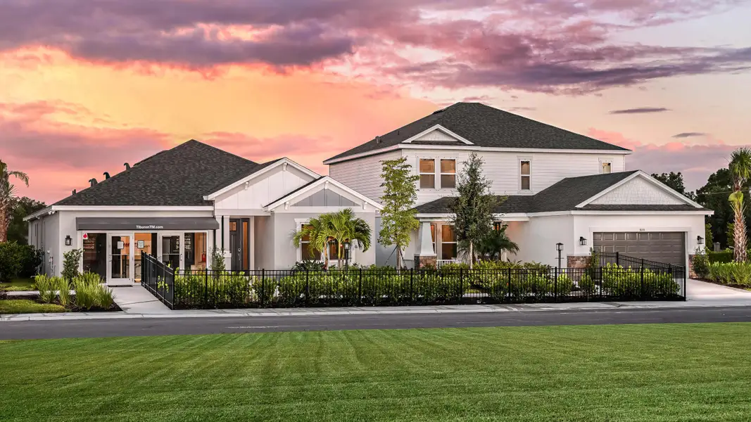 Front exterior of a new home in Tiburon, Nokomis, FL, highlighting curb appeal (Image 2). Front exterior of a new home in Tiburon, Nokomis, FL, highlighting curb appeal (Image 2).