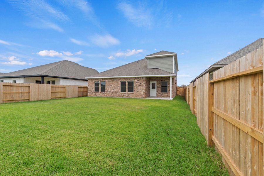 Exterior details and patio area of a home in Windrose Green, Angleton (Image 3). Exterior details and patio area of a home in Windrose Green, Angleton (Image 3).