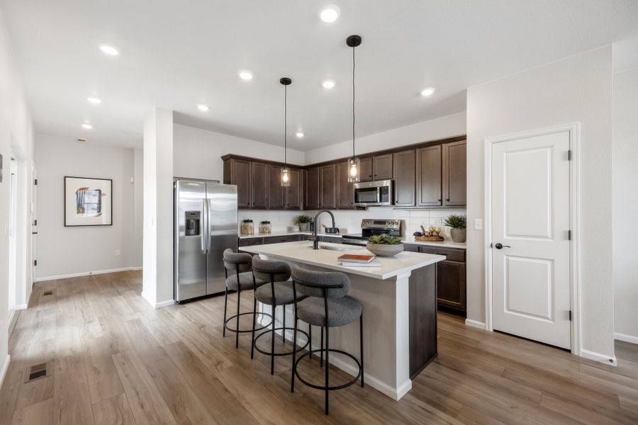 Representative furnished interior of a home built from the 2503 by Risewell Homes in Harvest Crossing, Aurora (Image 12).