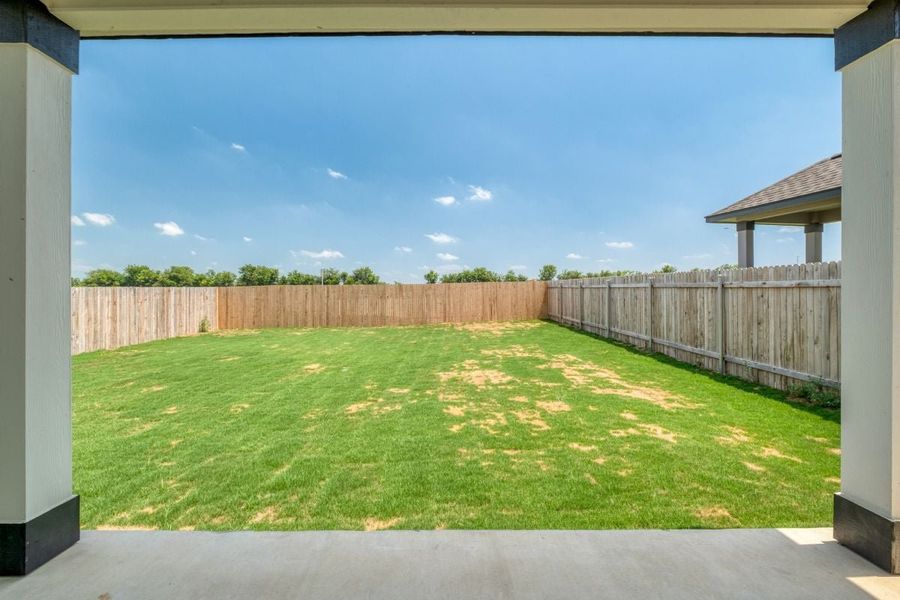 Exterior details and patio area of a home in Overlook Ranch, Georgetown (Image 4).