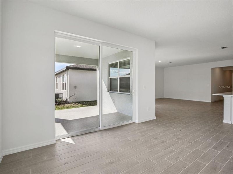 Spacious, unfurnished interior of a new home in Coasterra - Reserve Series, Palmetto (Image 27).