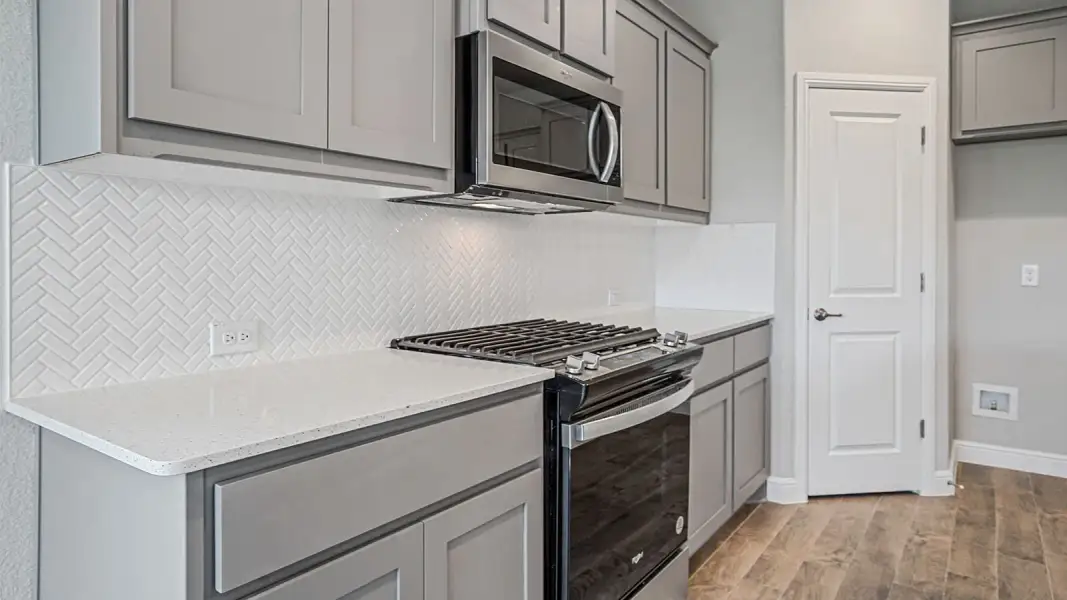 Furnished interior view inside a new home in Parkerville Meadows, DeSoto (Image 9).