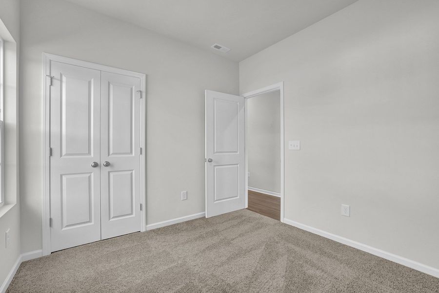 Spacious, unfurnished interior of a new home in River Tide Farms, Bolivia (Image 22).