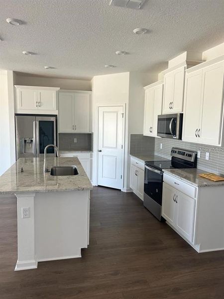 Furnished interior view inside a new home in Soleil, Kissimmee (Image 5).