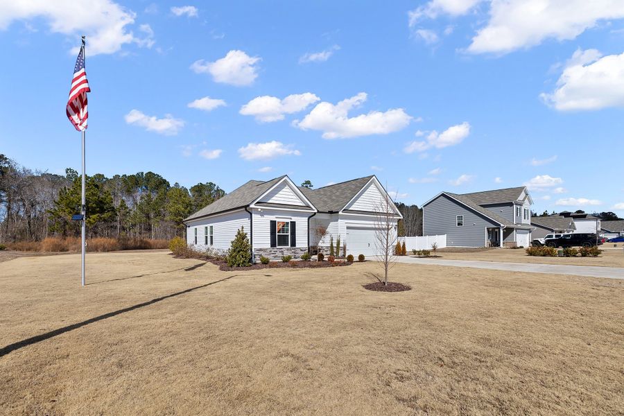 Front exterior of a new home in Briarwood Bluff, Sanford, NC, highlighting curb appeal (Image 17).