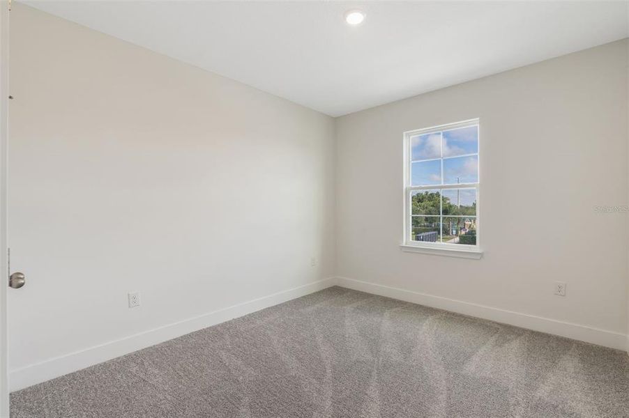 Spacious, unfurnished interior of a new home in Magnolia Reserve, Ocoee (Image 19).