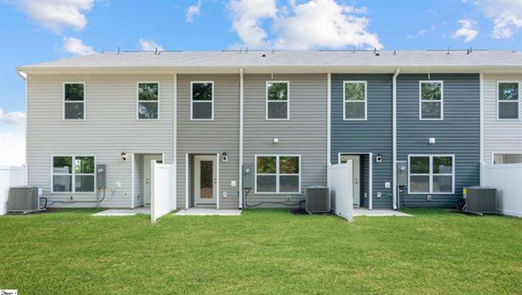 Exterior details and patio area of a home in Chestnut Ridge Townhomes, Greenville (Image 2).