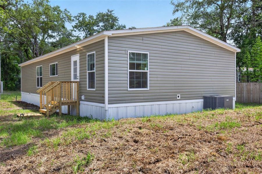 Exterior details and patio area of a home in , Brooksville (Image 24).