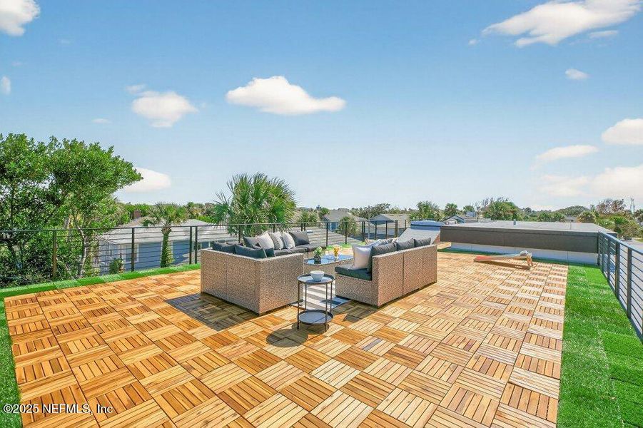 Exterior details and patio area of a home in , Neptune Beach (Image 43).
