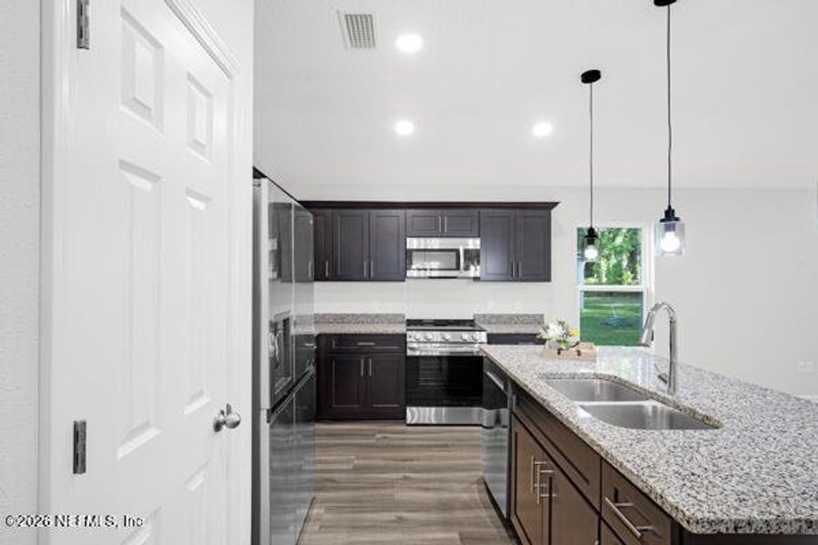 Furnished interior view inside a new home in , Satsuma (Image 12).