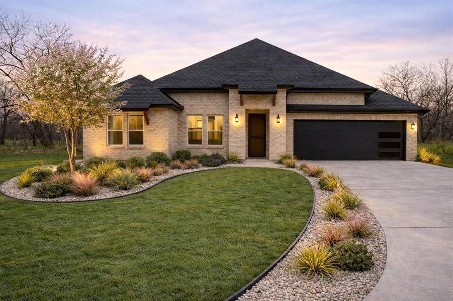 Front exterior of a new home in , Sherman, TX, highlighting curb appeal (Image 26). Front exterior of a new home in , Sherman, TX, highlighting curb appeal (Image 26).