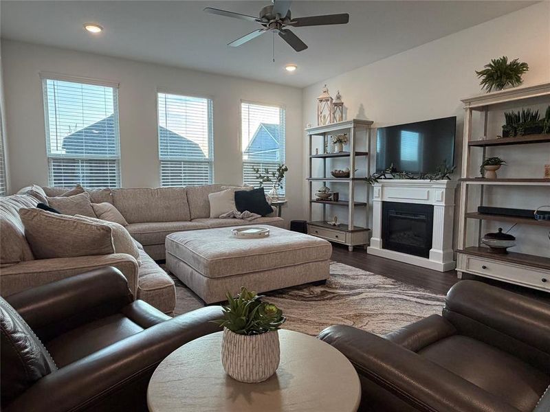Living Spacious Enough for Huge Sectional and Lounge Chairs. Freestanding Fireplace to Remain.