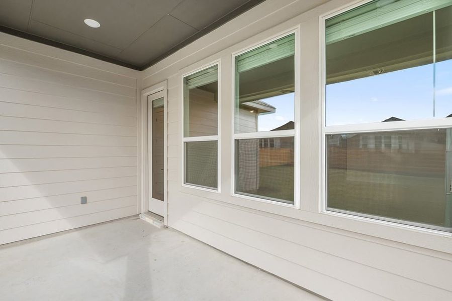 Exterior details and patio area of a home in Arbor Collection at Heritage, Dripping Springs (Image 4).