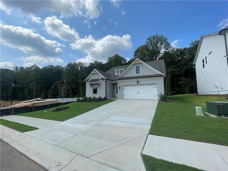 Front exterior of a new home in Summerlin, Winder, GA, highlighting curb appeal (Image 20).