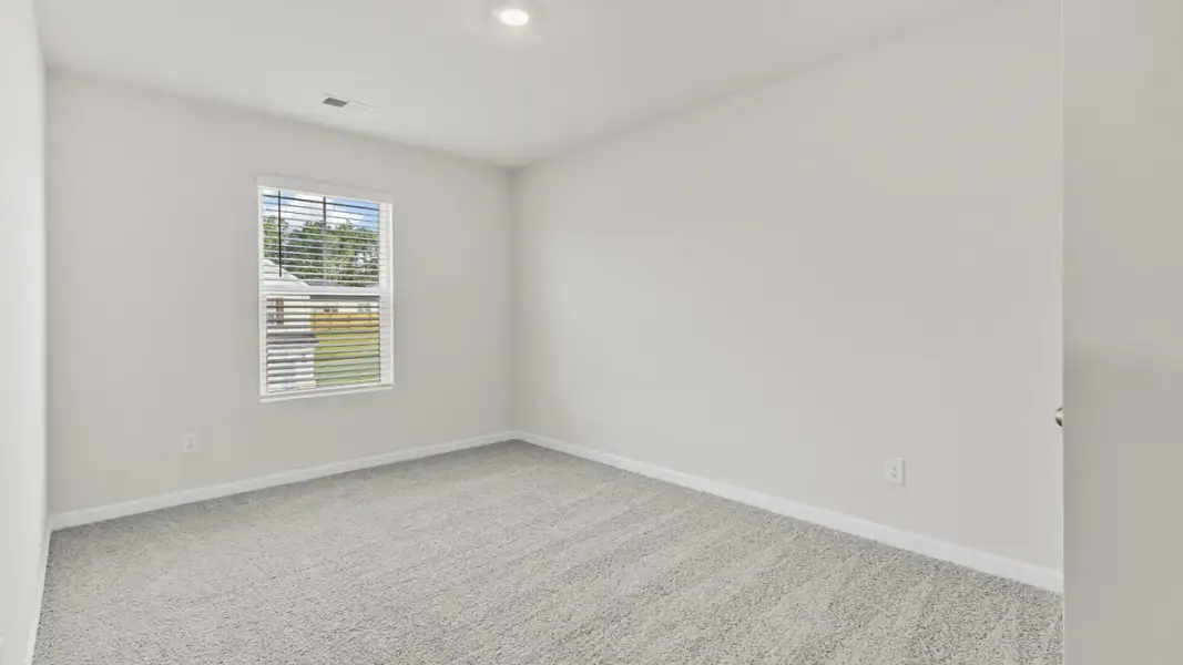 Representative unfurnished interior of a home built from the Ansley by D.R. Horton in Walden Ridge, Macon (Image 29).