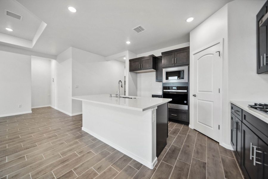 Representative furnished interior of a home built from the Valencia by Hakes Brothers in Summer Sky North, El Paso (Image 7).