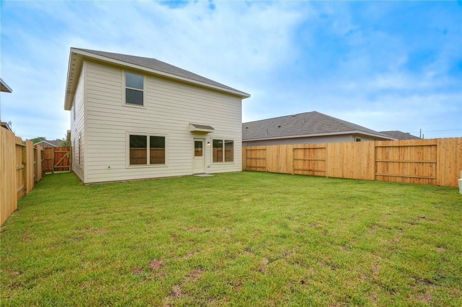 Exterior details and patio area of a home in Becker Landing, Hockley (Image 25).