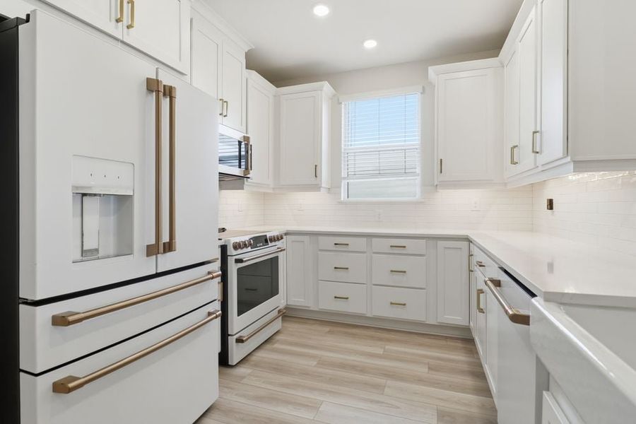 Furnished interior view inside a new home in Esplanade by the Islands Coach Homes, Naples (Image 4).