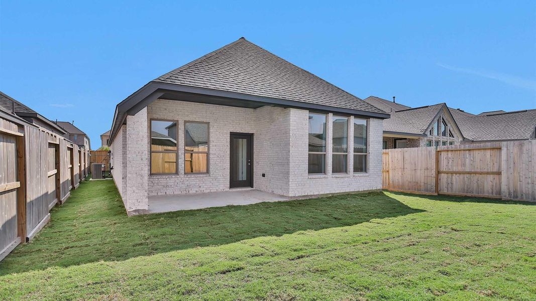 Exterior details and patio area of a home in Candela 40', Richmond (Image 2).