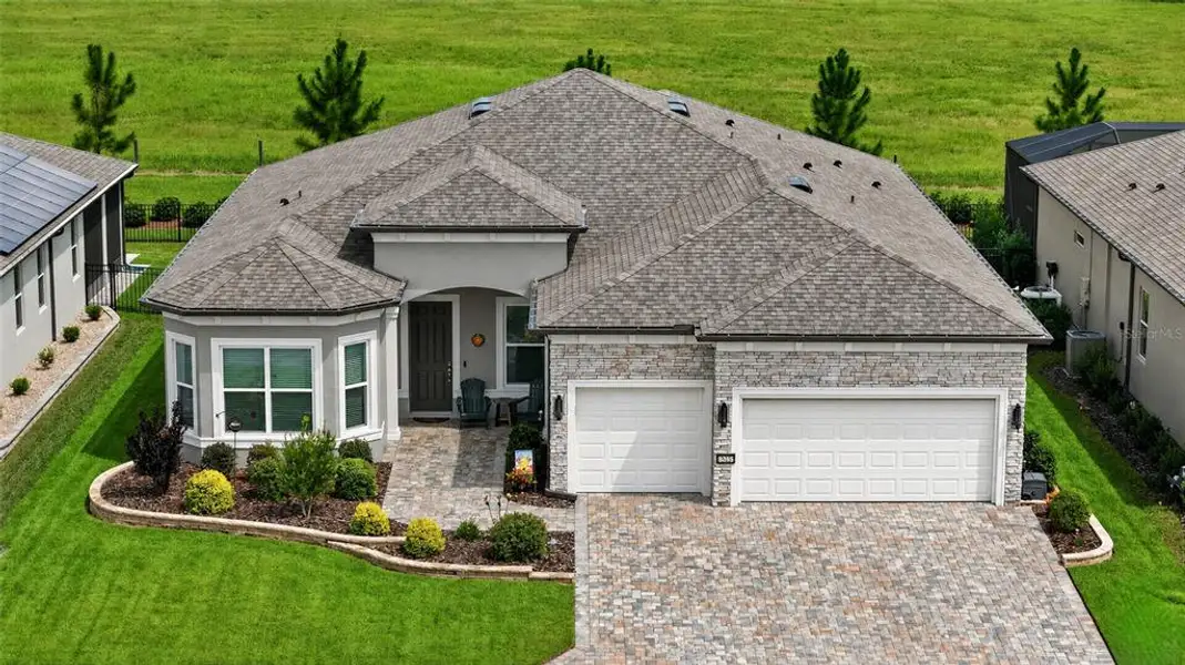 Front exterior of a new home in , Ocala, FL, highlighting curb appeal (Image 2).