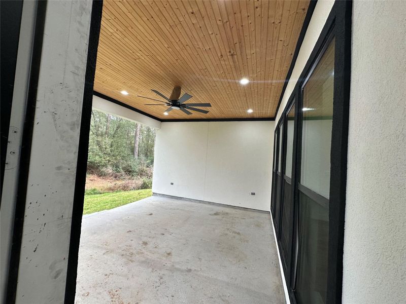 Exterior details and patio area of a home in , Humble (Image 25).