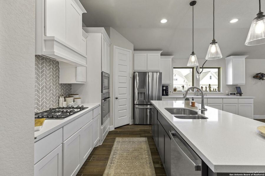 Furnished interior view inside a new home in The Village of Mill Creek 50', Seguin (Image 29).