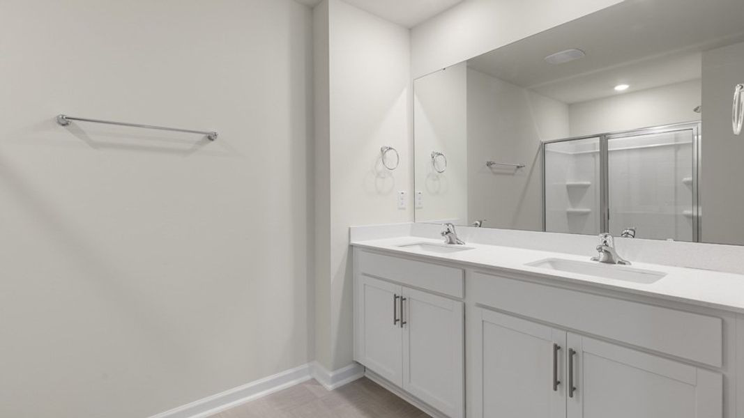 Furnished interior view inside a new home in The Grove at Matthews Landing, Fuquay Varina (Image 7).
