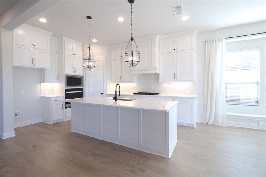 Furnished interior view inside a new home in M3 Ranch Phase 1, Mansfield (Image 3).