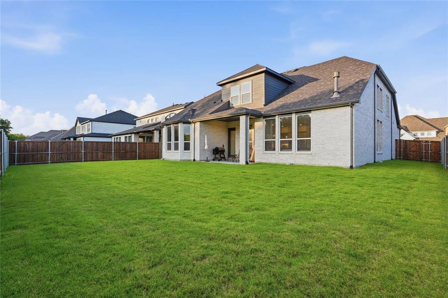 Exterior details and patio area of a home in Sonoma Verde, McLendon-Chisholm (Image 26).