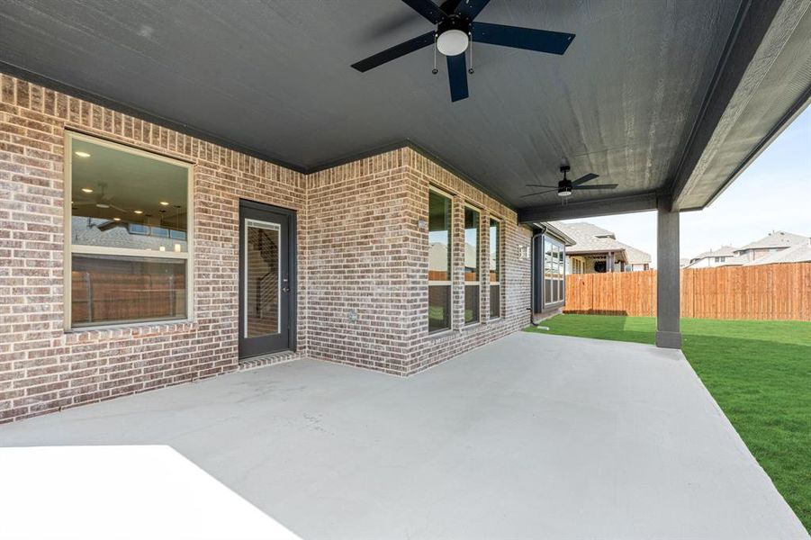 Exterior details and patio area of a home in Country Lakes Classic 60, Argyle (Image 3).