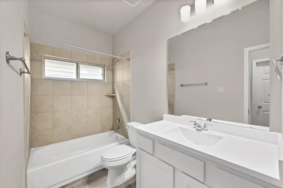 Furnished interior view inside a new home in Enclave at Willis, Willis (Image 8). Furnished interior view inside a new home in Enclave at Willis, Willis (Image 8).