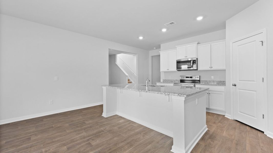 Representative furnished interior of a home built from the ARCHER-EXP by D.R. Horton in Lakeview at Kitfield, Moncks Corner (Image 6).