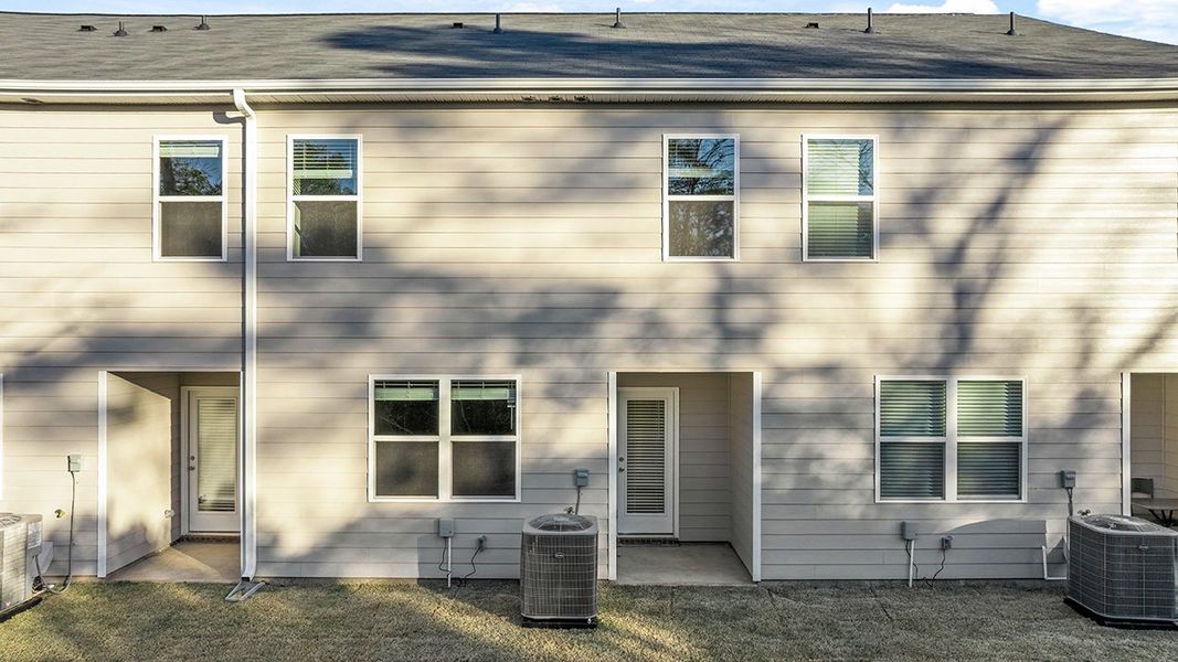 Exterior details and patio area of a home in Laurel Park Townhomes, Hephzibah (Image 3).