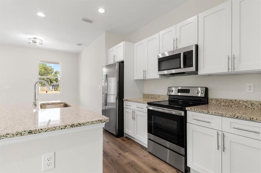 Furnished interior view inside a new home in , Port Charlotte (Image 8). Furnished interior view inside a new home in , Port Charlotte (Image 8).