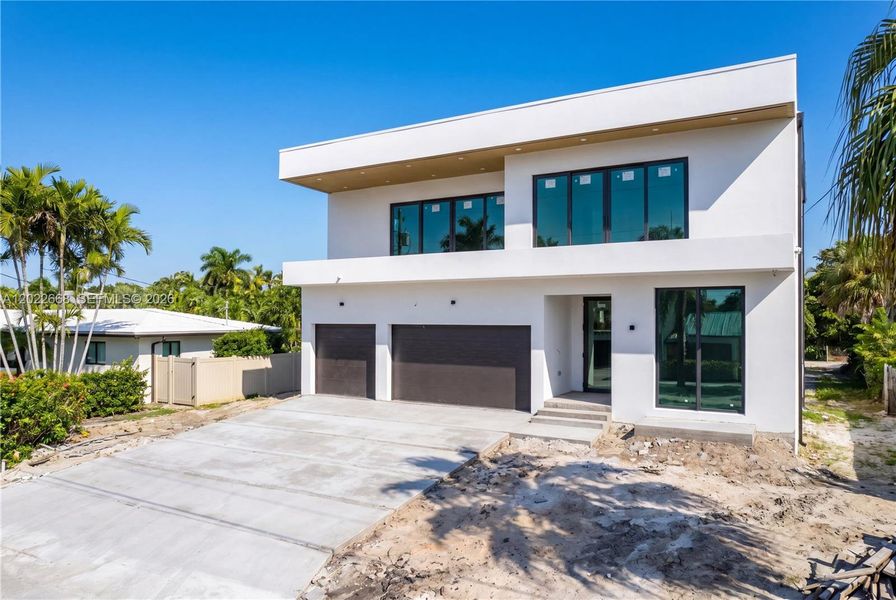 Front exterior of a new home in , Fort Lauderdale, FL, highlighting curb appeal (Image 5).