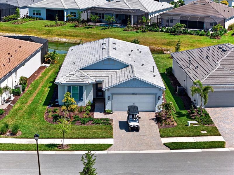 Front exterior of a new home in , Englewood, FL, highlighting curb appeal (Image 24).