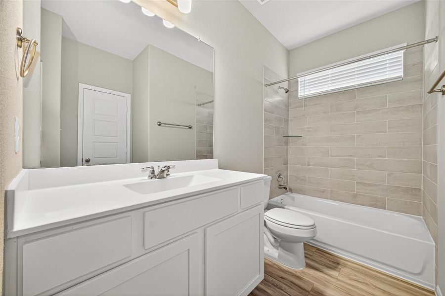 Furnished interior view inside a new home in Sunterra, Katy (Image 11).