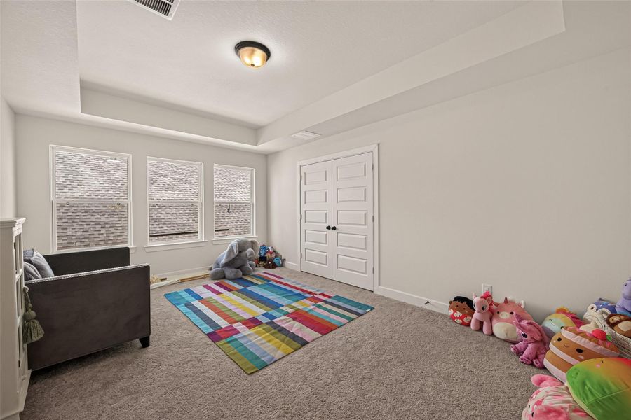 The upstairs game room offers the perfect space for movie nights or playtime. The upstairs game room offers the perfect space for movie nights or playtime.