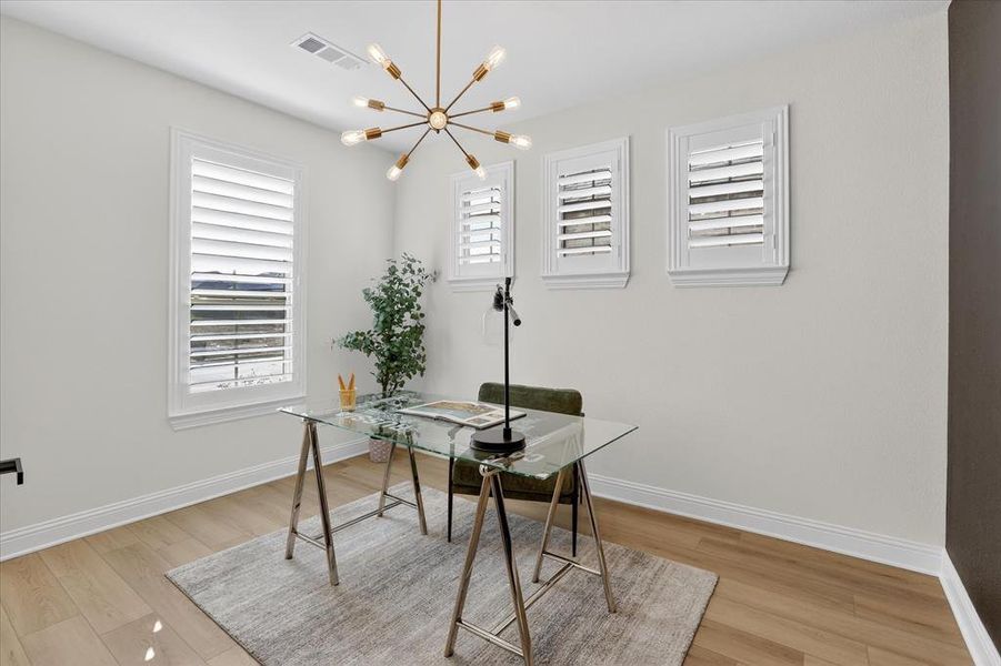 This is a multi use space for office, sitting room, wine room, formal dinning room.