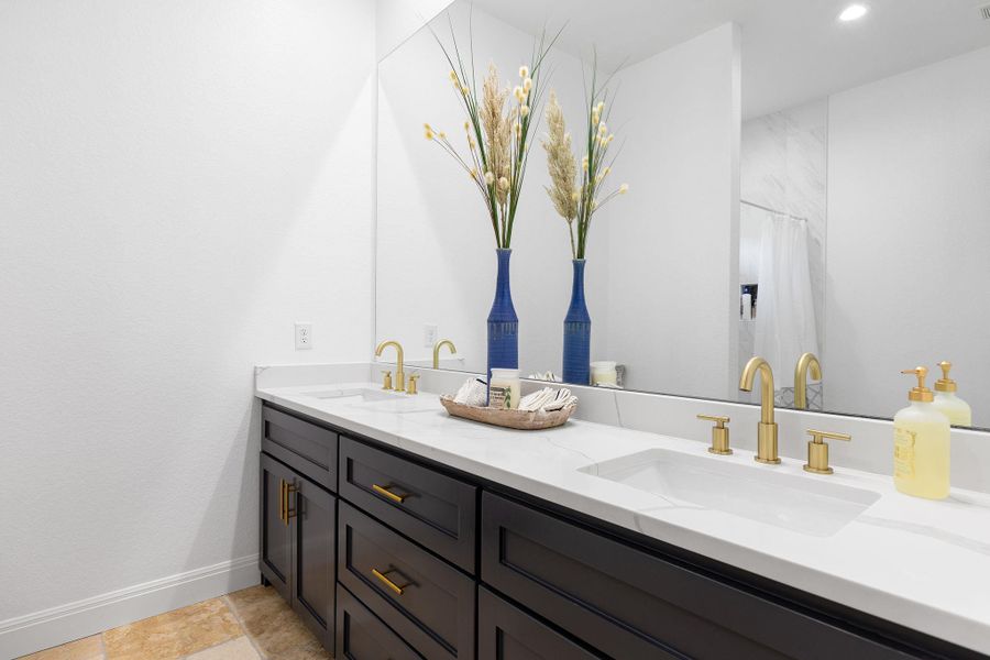 Full bath with double vanity, recessed lighting, and a shower with curtain Full bath with double vanity, recessed lighting, and a shower with curtain
