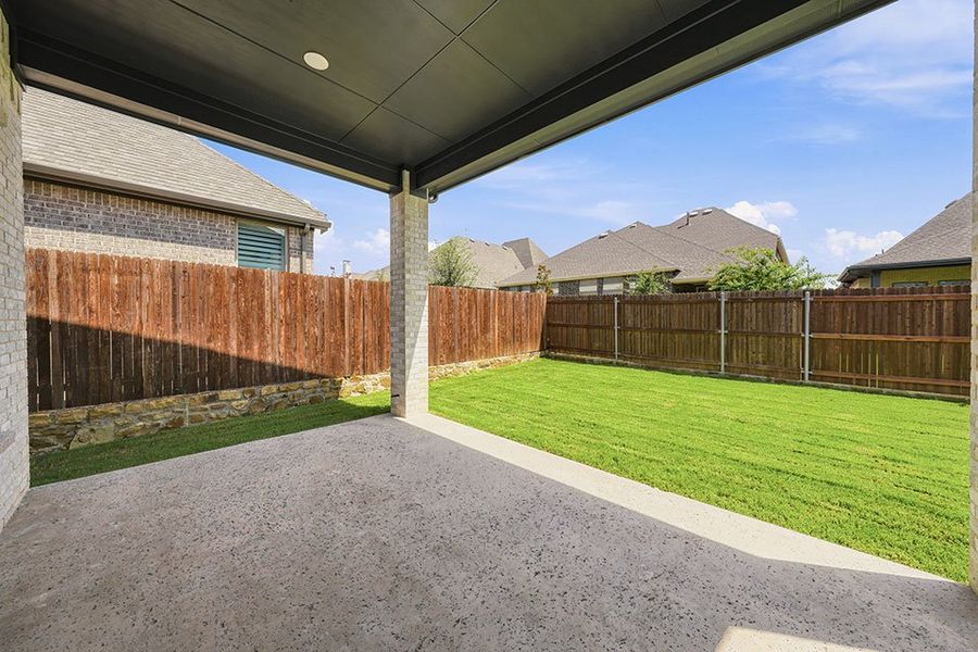 Exterior details and patio area of a home in Tavolo Park, Fort Worth (Image 3).