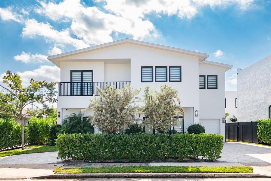 Front exterior of a new home in , West Palm Beach, FL, highlighting curb appeal (Image 1). Front exterior of a new home in , West Palm Beach, FL, highlighting curb appeal (Image 1).