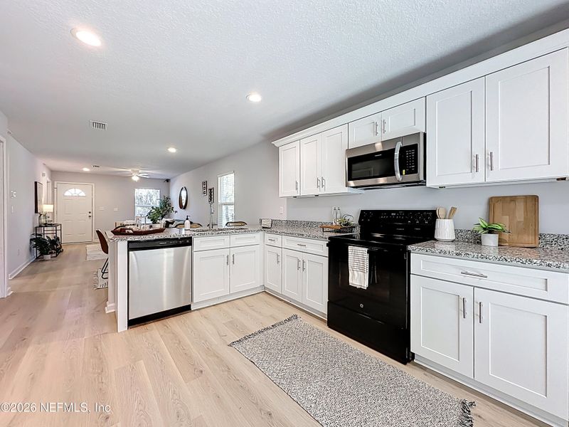 Furnished interior view inside a new home in , Jacksonville (Image 11).