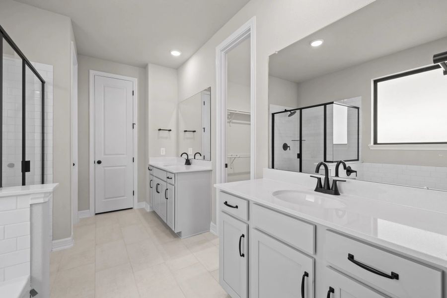 Primary bath. Note: Sample product photo. Actual exterior and interior selections may vary by homesite. Photo may be virtually staged