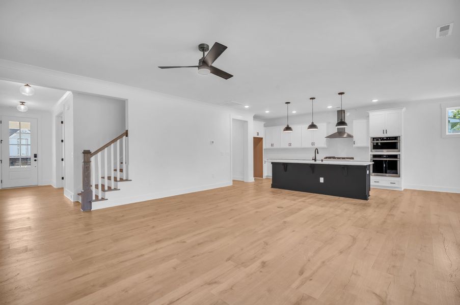 Representative furnished interior of a home built from the The Bradley by RobuckHomes in Windwater, Hampstead (Image 8).