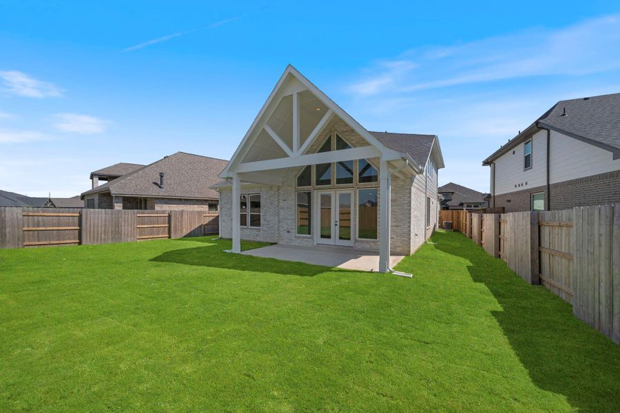 Large Backyard with covered patio.