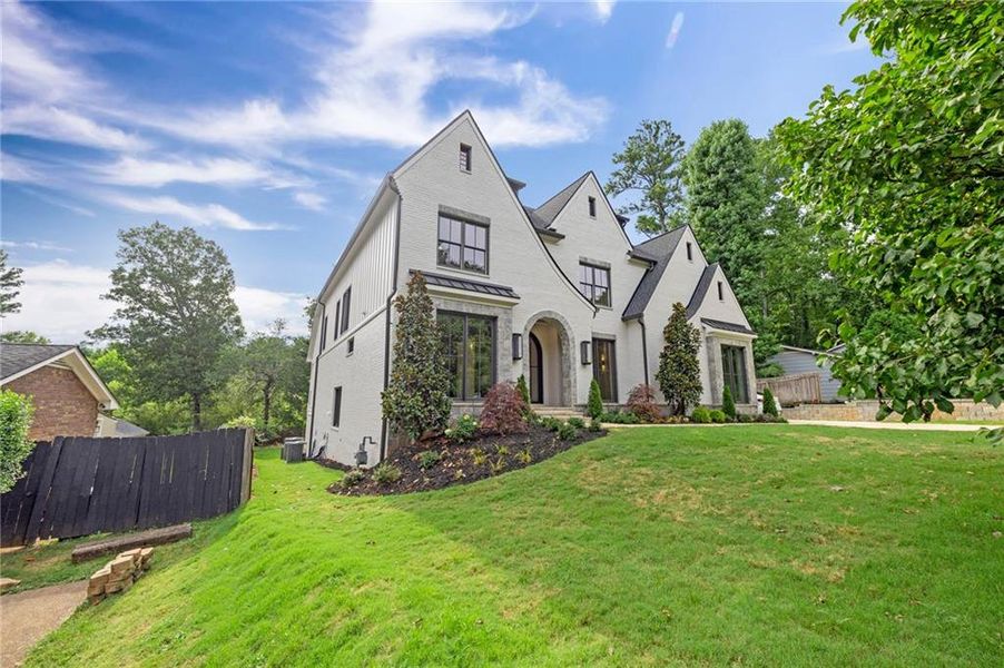 Front exterior of a new home in , Alpharetta, GA, highlighting curb appeal (Image 2). Front exterior of a new home in , Alpharetta, GA, highlighting curb appeal (Image 2).