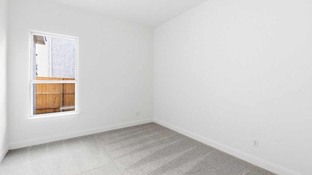 Furnished interior view inside a new home in Oaks at San Gabriel, Georgetown (Image 16).